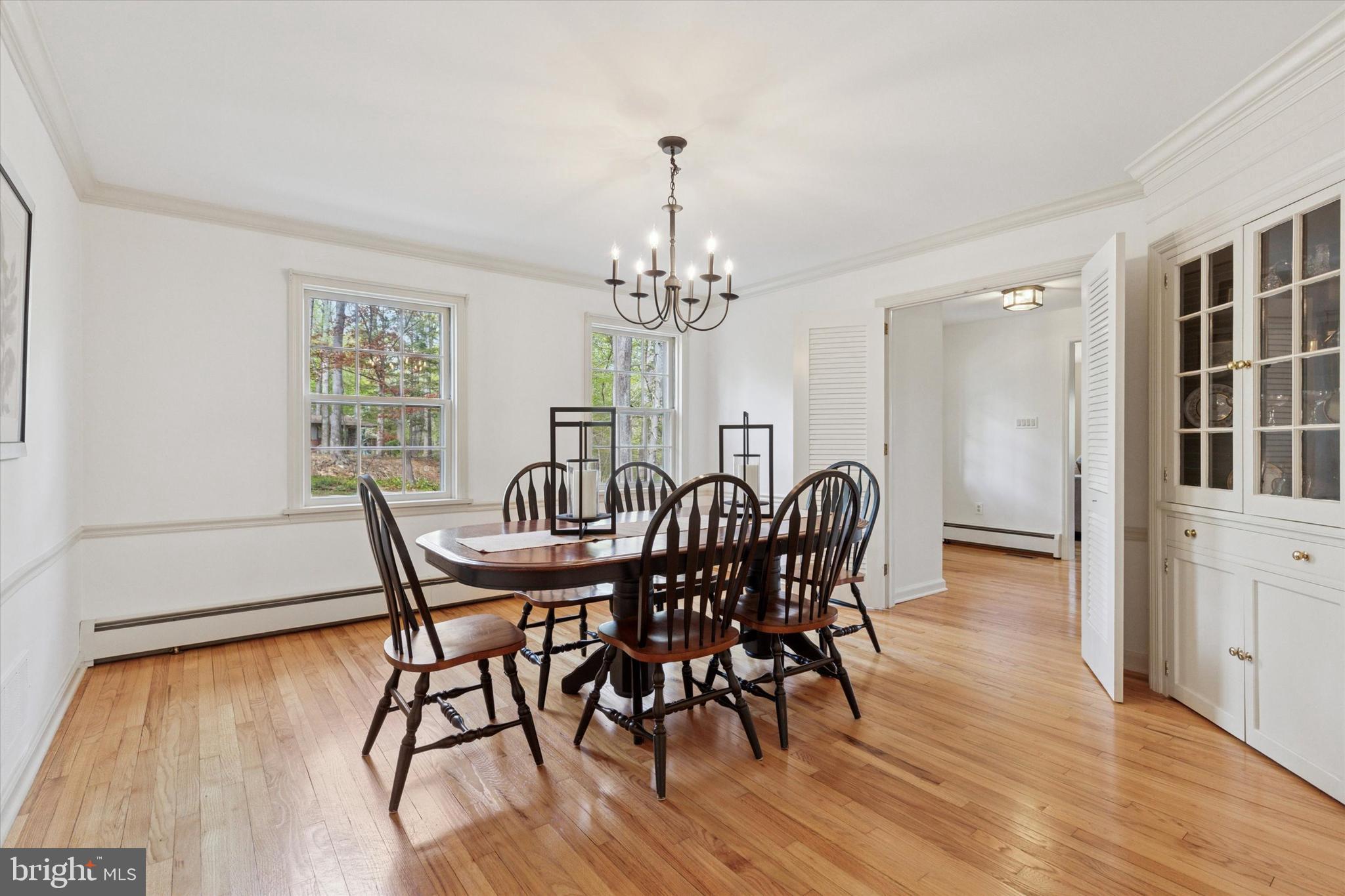 99 Elfman Drive Doylestown, PA 18901 - Photo 12 of 35 a view of a dining room with furniture window and wooden floor