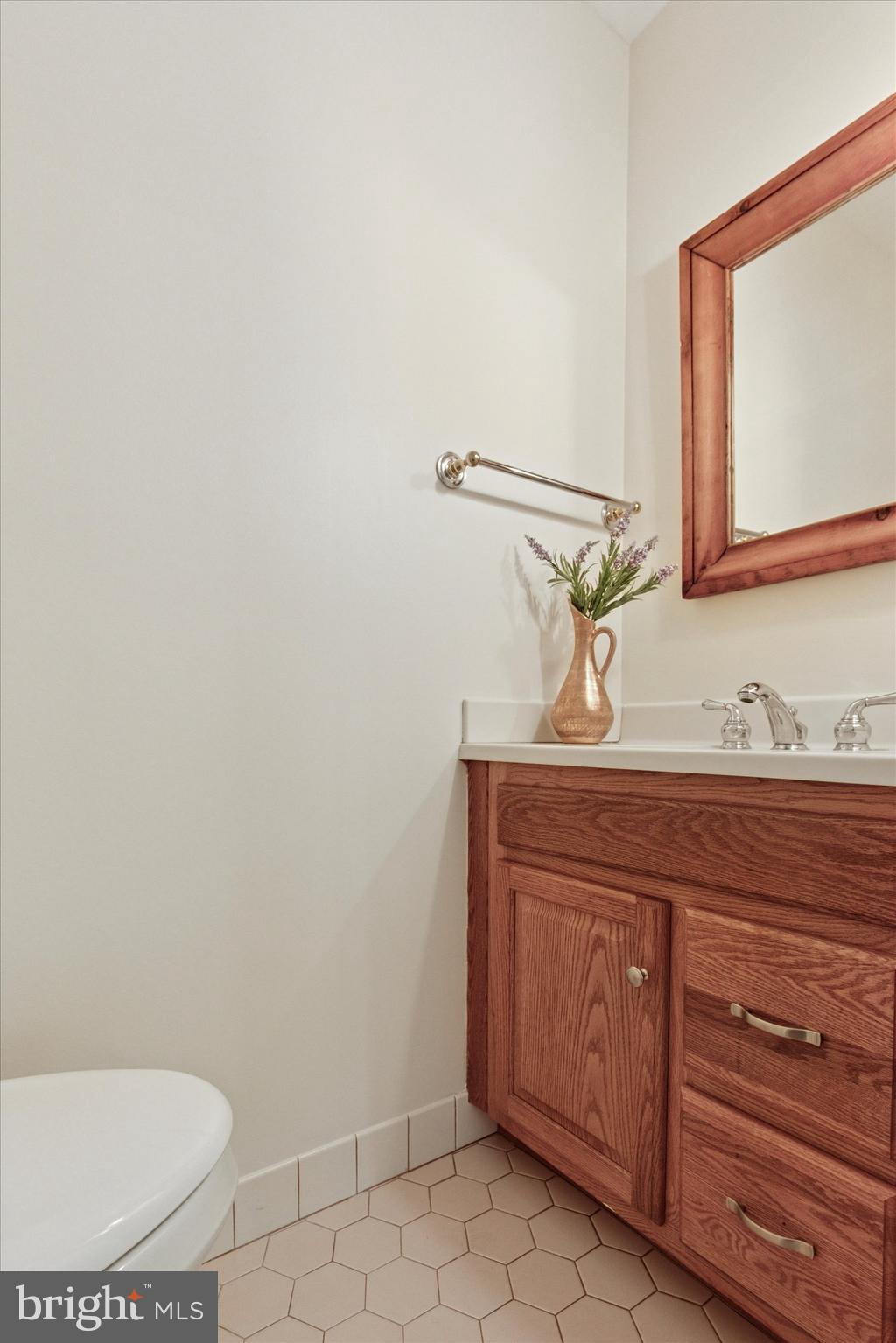 99 Elfman Drive Doylestown, PA 18901 - Photo 20 of 35 a bathroom with a toilet and a sink