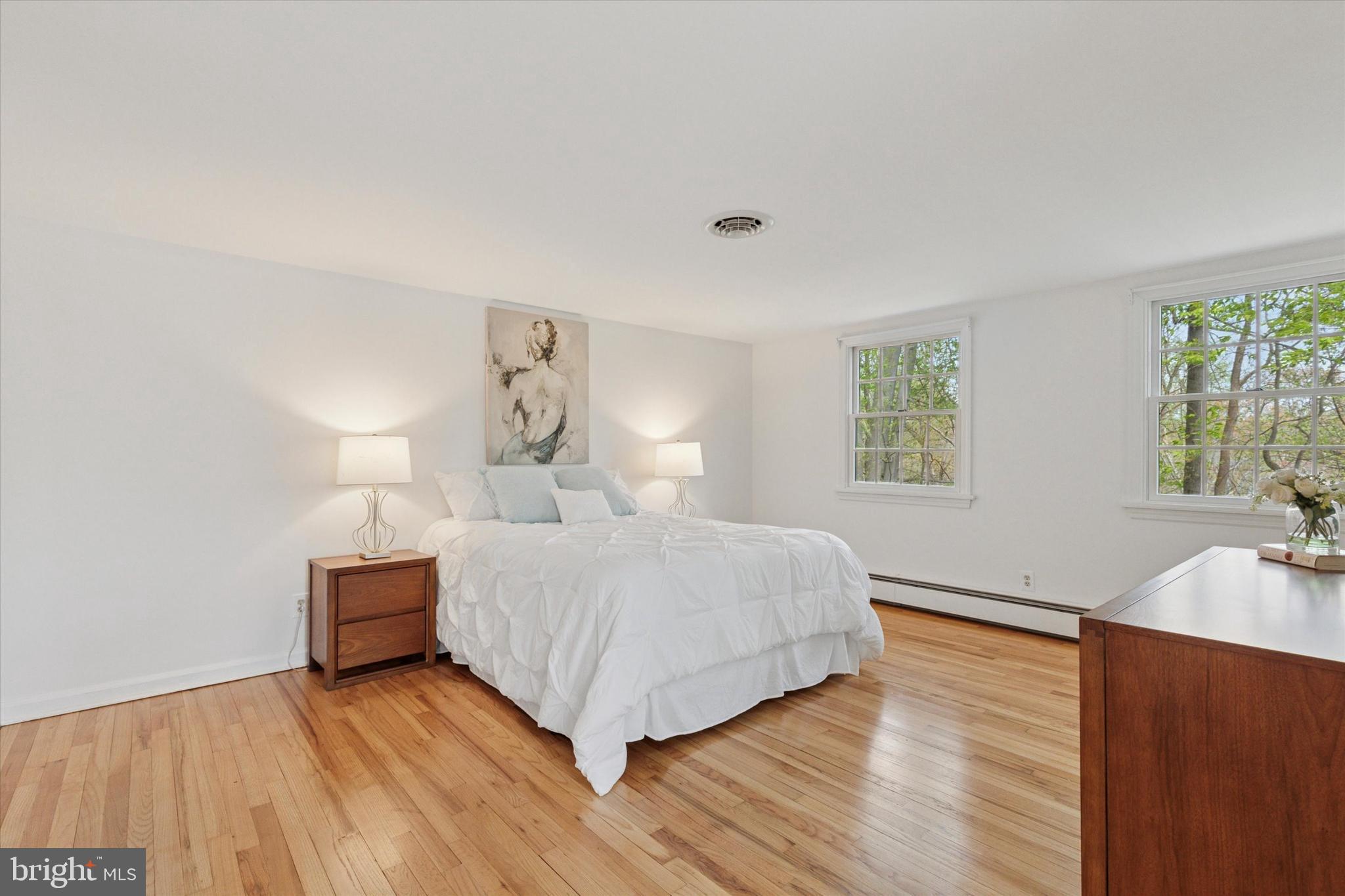 99 Elfman Drive Doylestown, PA 18901 - Photo 21 of 35 a bedroom with a bed and a table