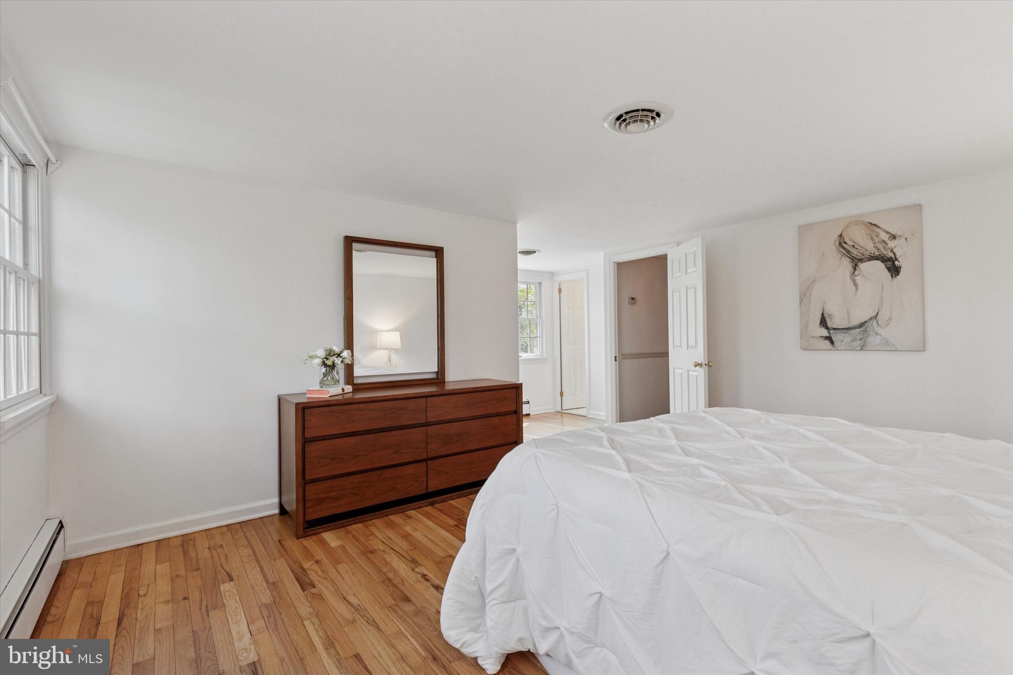 99 Elfman Drive Doylestown, PA 18901 - Photo 22 of 35 a bed room with a bed and a night stand