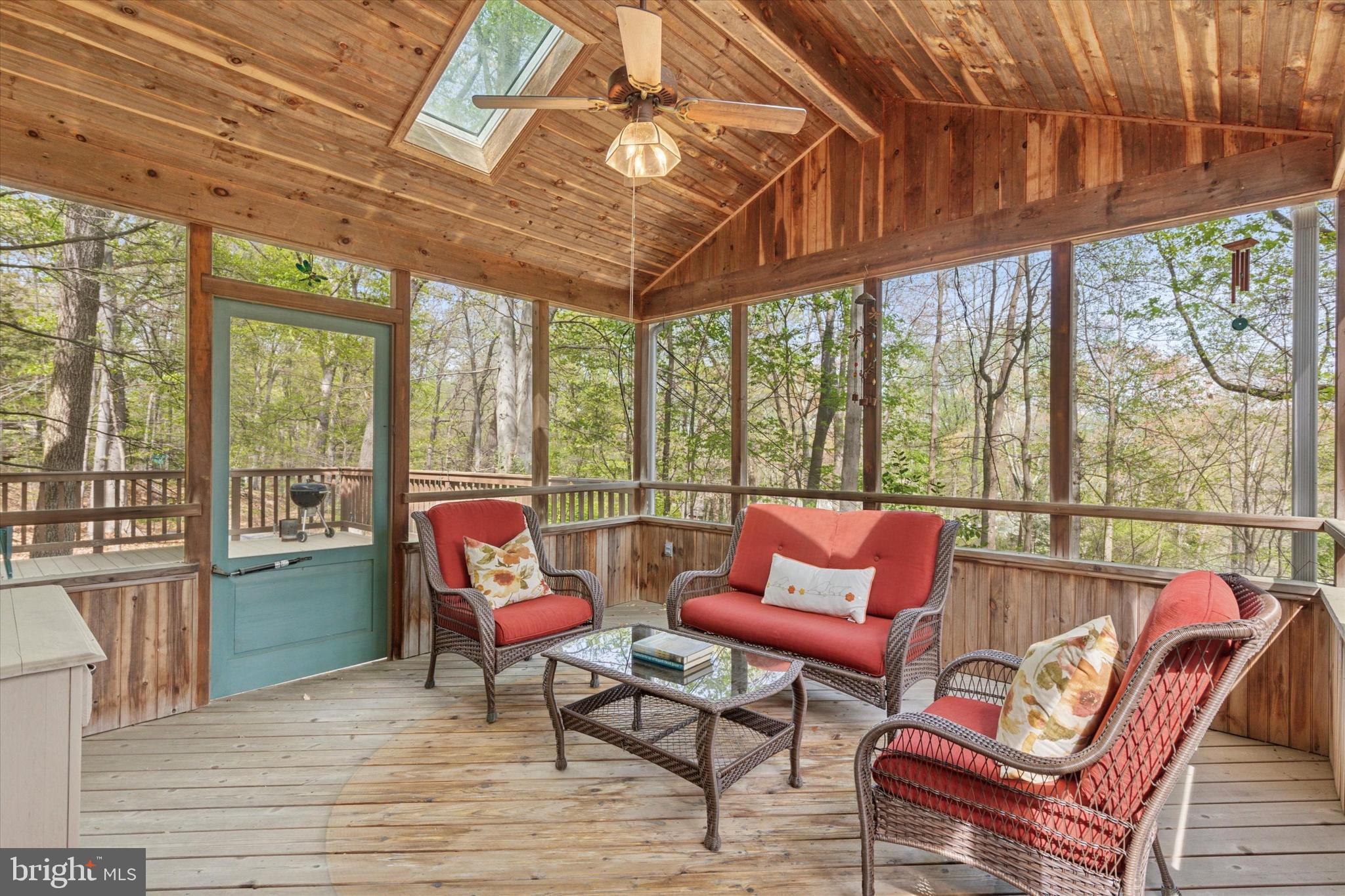 99 Elfman Drive Doylestown, PA 18901 - Photo 28 of 35 a blue chair sitting in front of a building