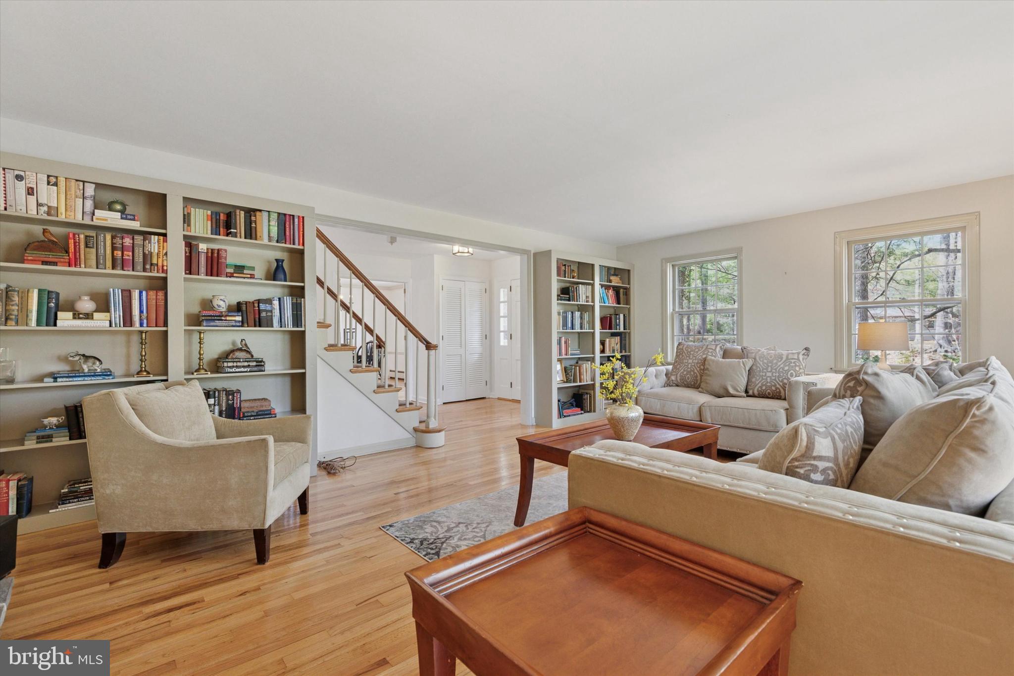 99 Elfman Drive Doylestown, PA 18901 - Photo 5 of 35 a living room with furniture and a book shelf