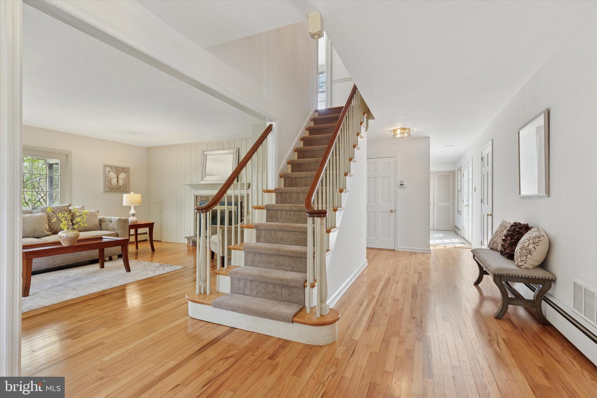 99 Elfman Drive Doylestown, PA 18901 - Photo 10 of 35 a view of a livingroom with furniture and hardwood floor