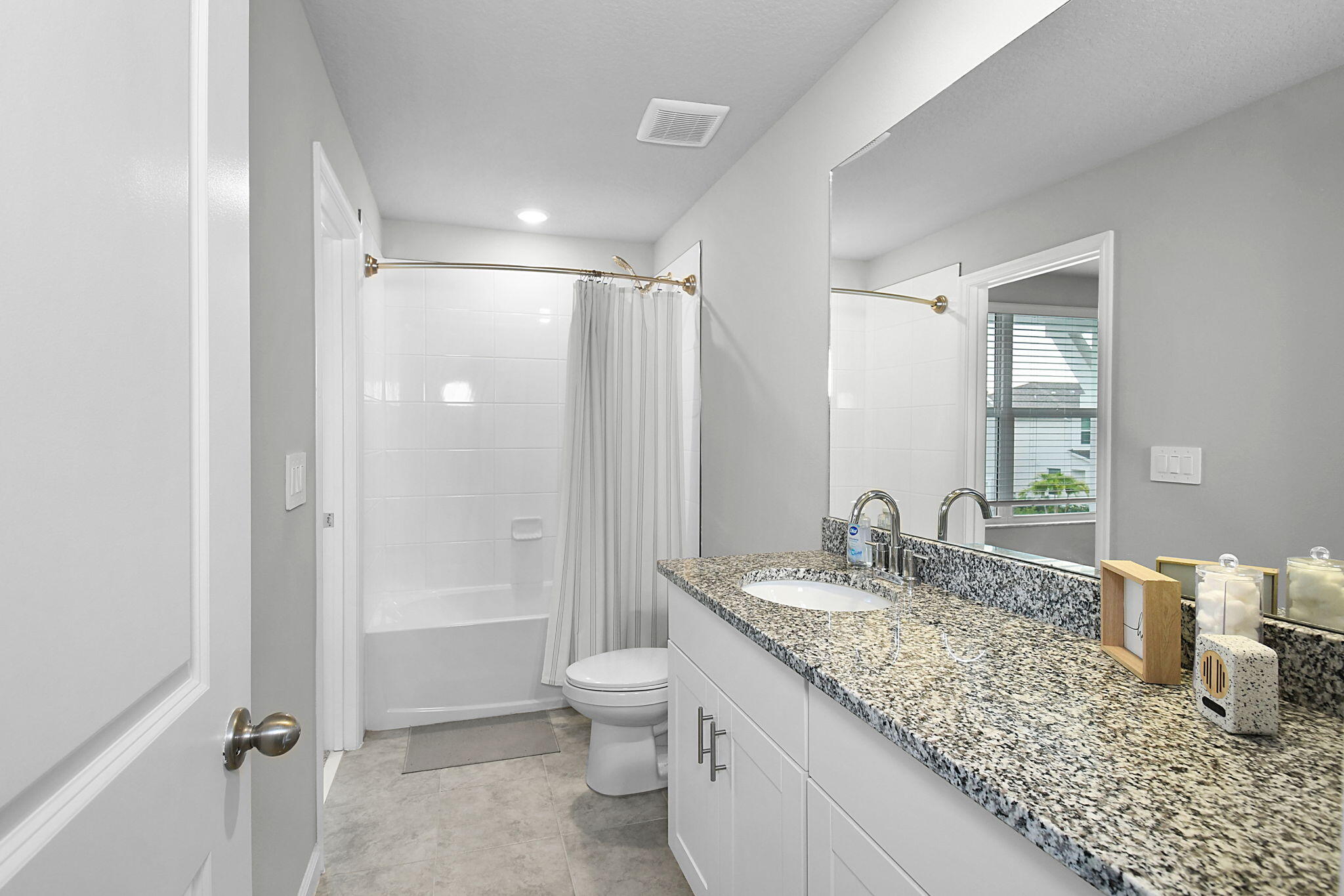 5766 Southeast Edgewater Circle Stuart, FL 34997 - Photo 29 of 47 Jack & Jill Guest Bathroom