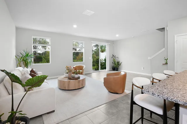 a living room with furniture and window