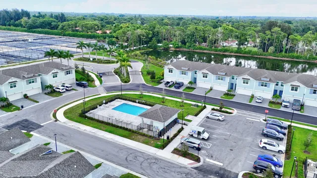 a view of a swimming pool with a garden