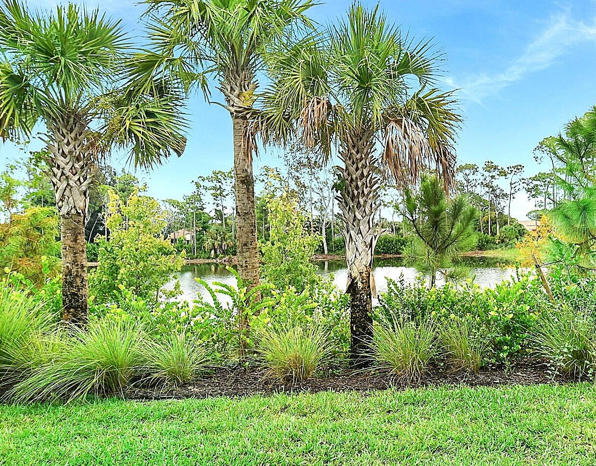 5766 Southeast Edgewater Circle Stuart, FL 34997 - Photo 8 of 47 Lake View from Patio Slider