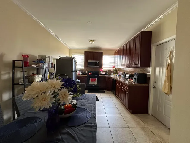 a view of a dining room with furniture