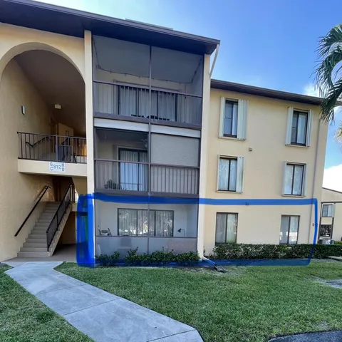 a view of building with yard