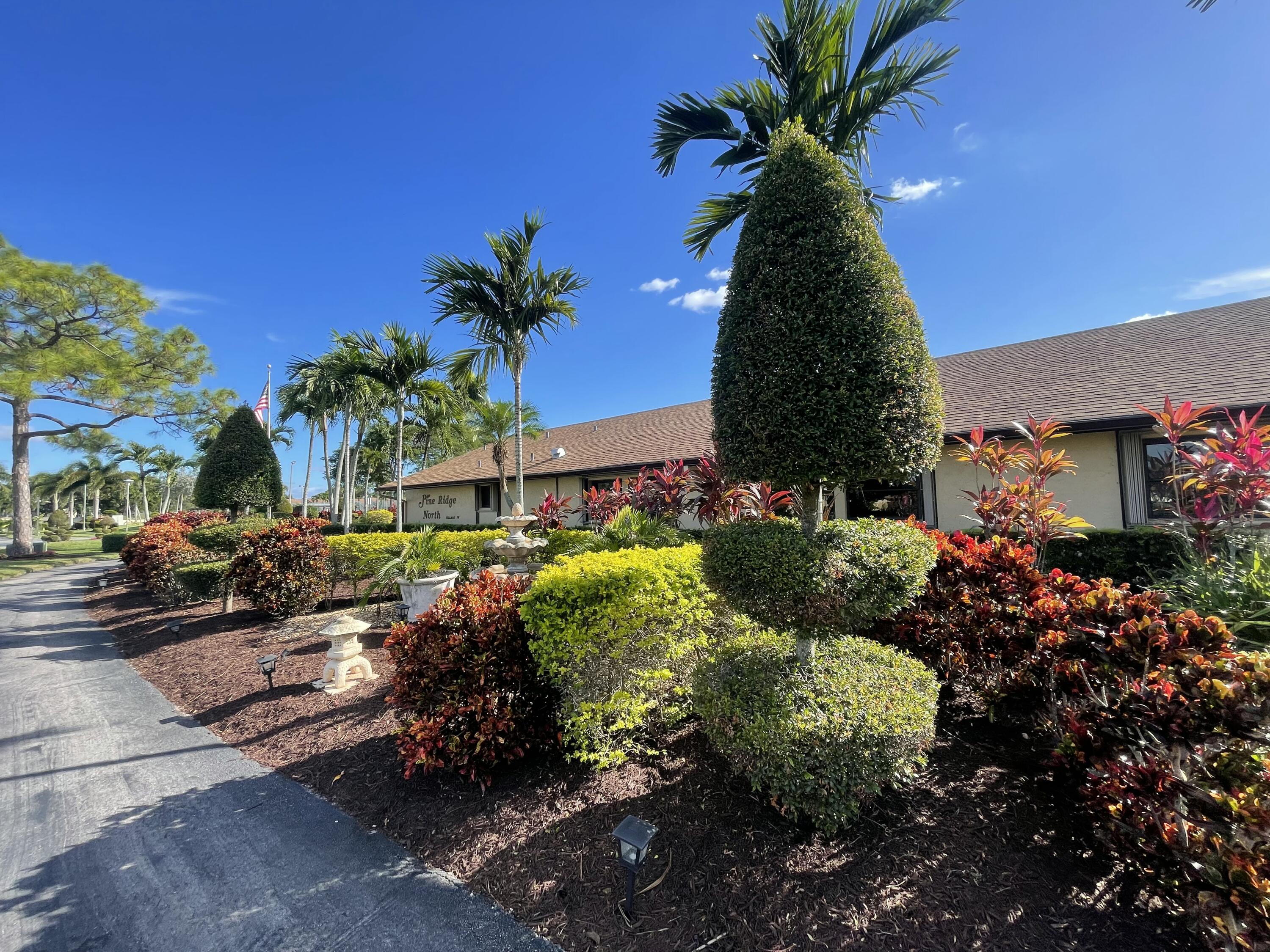 812 Sky Pine Way, Unit D1 Greenacres, FL 33415 - Photo 14 of 17 a view of outdoor space and yard