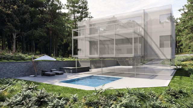 a view of a backyard with sitting area