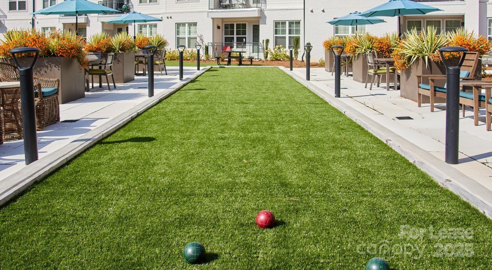 4101 Glenloch Circle, Unit B1 Matthews, NC 28105 - Photo 16 of 28 a view of a porch with a table and chairs