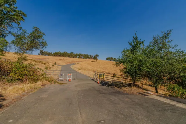 a view of a yard covered in snow