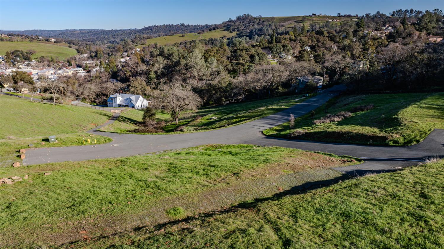 52 David Drive Sutter Creek, CA 95685 - Photo 6 of 10 an aerial view of a houses with a yard and lake view
