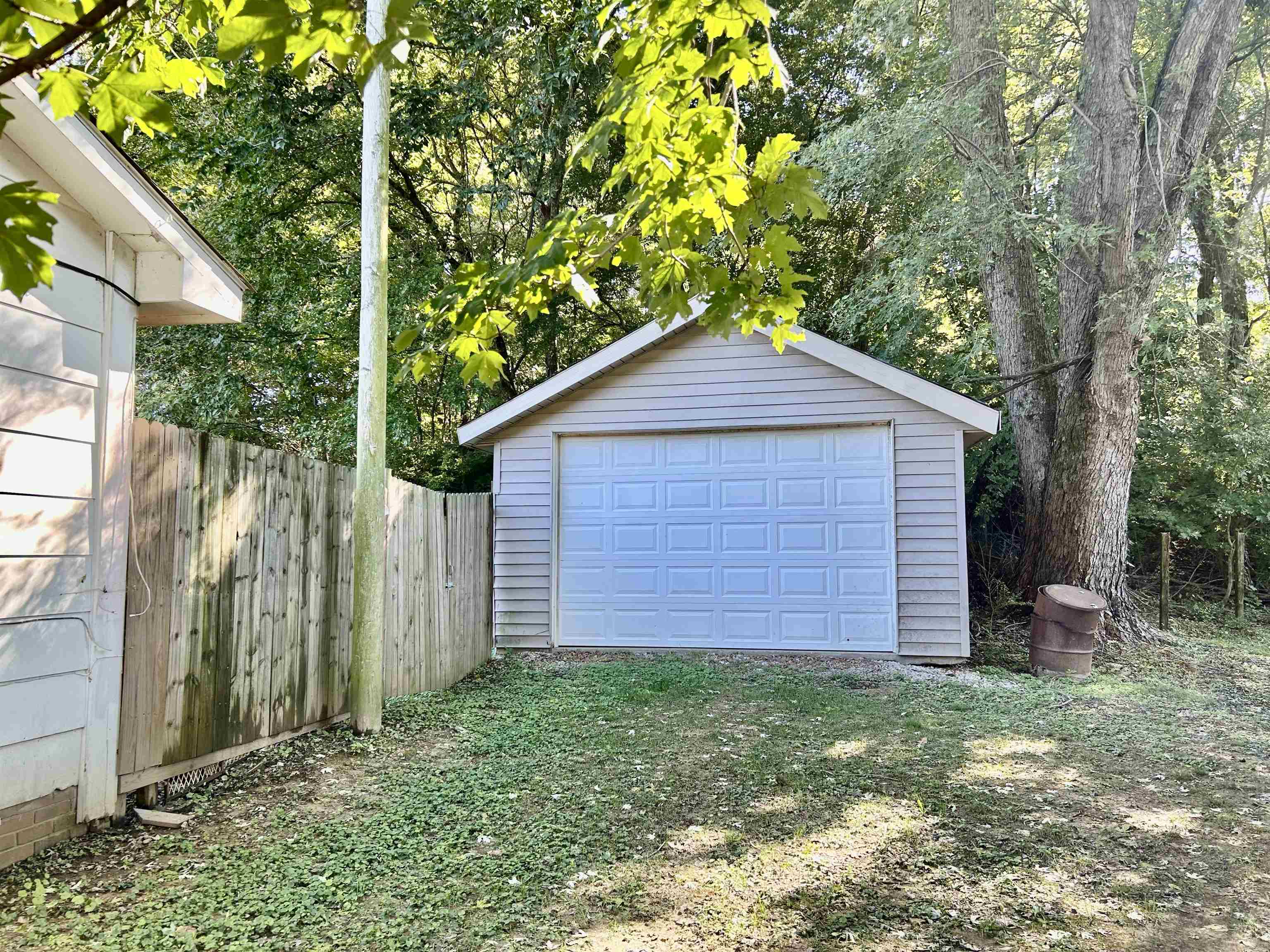 224 Mary Lynn Avenue Ripley, TN 38063 - Photo 2 of 16 a backyard of a house with lots of green space