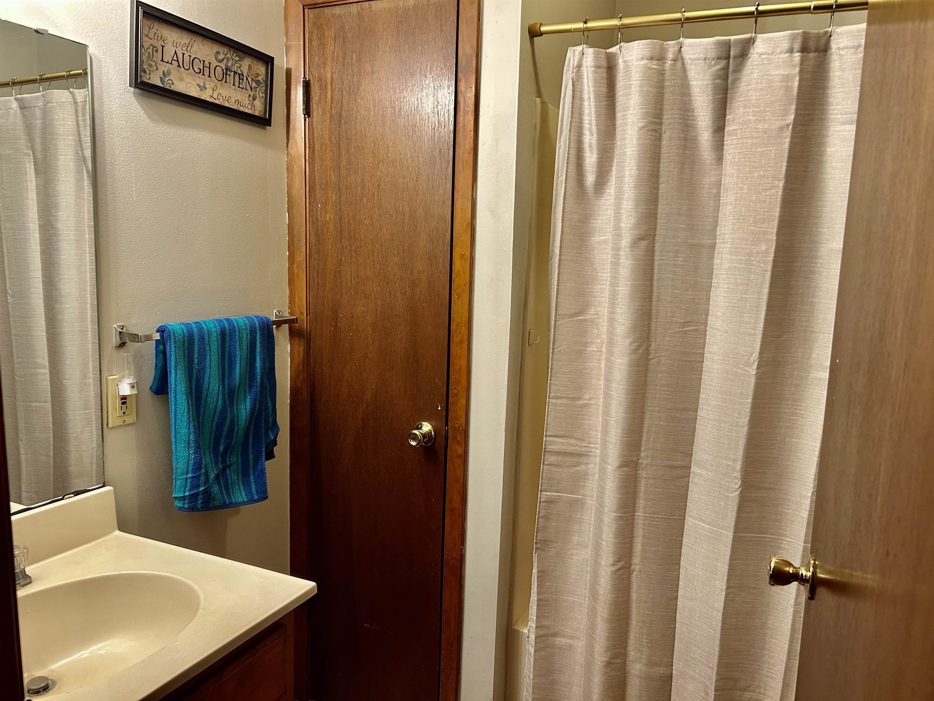 224 Mary Lynn Avenue Ripley, TN 38063 - Photo 10 of 16 a bathroom with a sink and a mirror