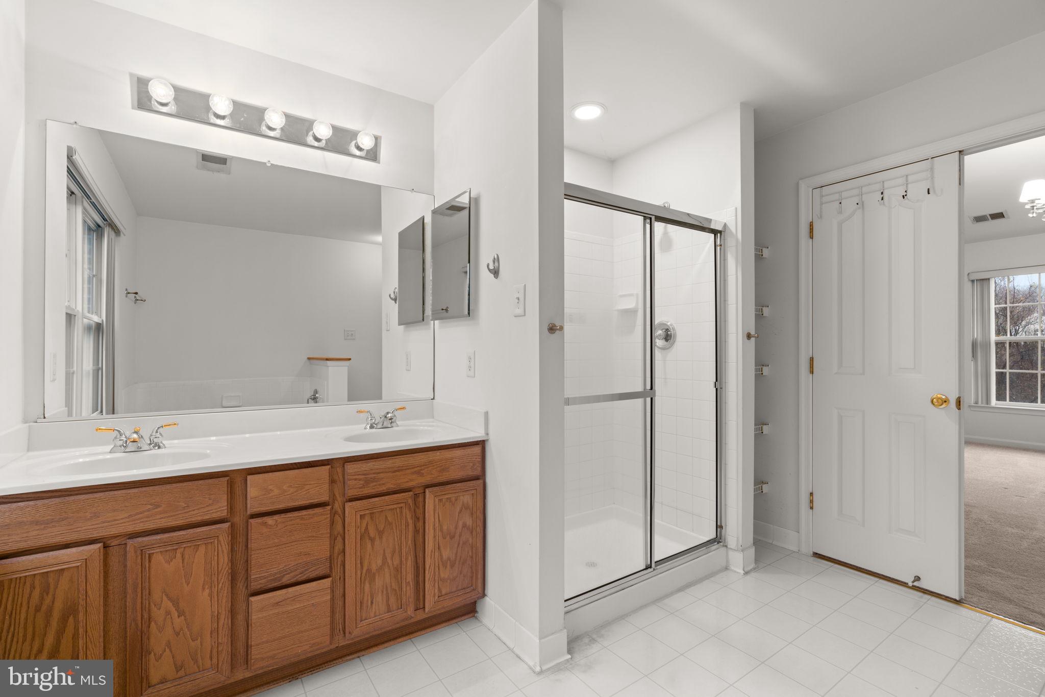 8708 Hidden Pool Court Laurel, MD 20723 - Photo 12 of 25 Primary Bath