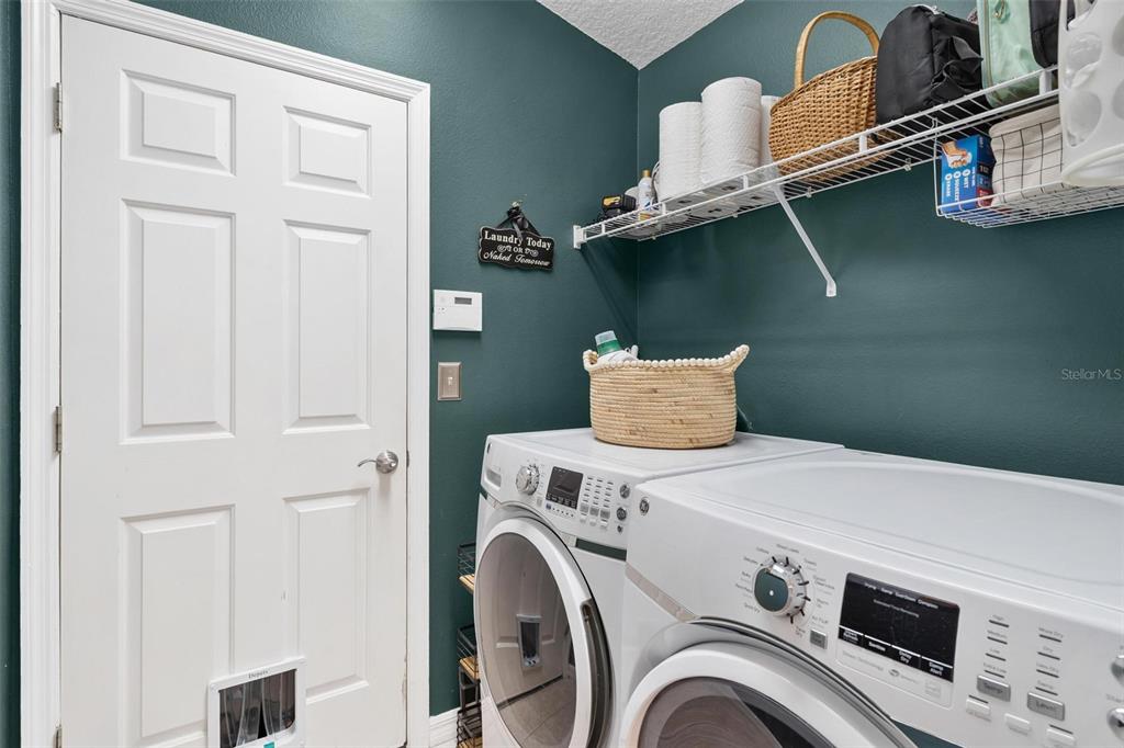 33142 Kaylee Way Leesburg, FL 34788 - Photo 22 of 45 a utility room with dryer and washer