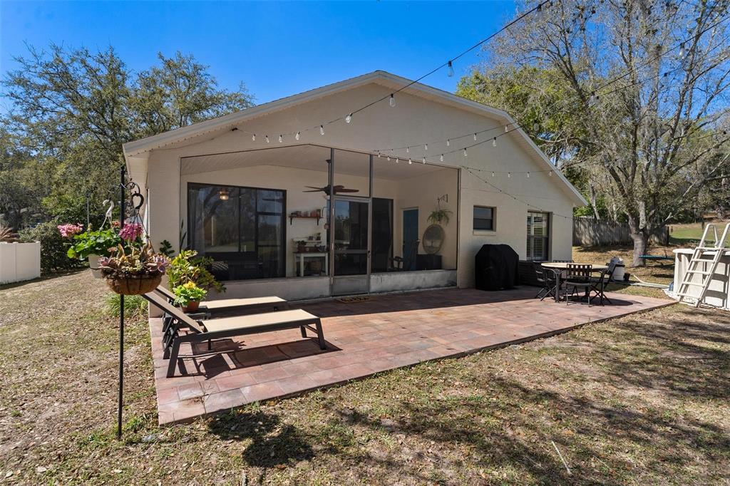 33142 Kaylee Way Leesburg, FL 34788 - Photo 3 of 45 a view of a outdoor space with a patio