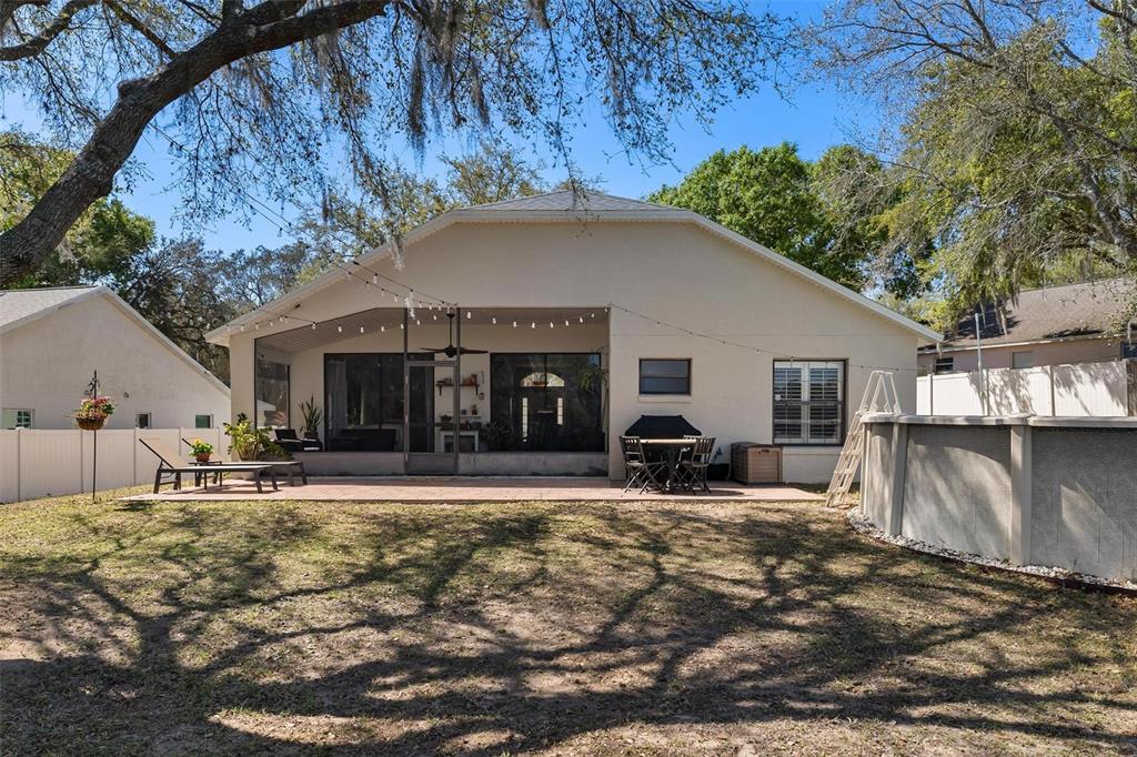 33142 Kaylee Way Leesburg, FL 34788 - Photo 39 of 45 a view of a house with backyard