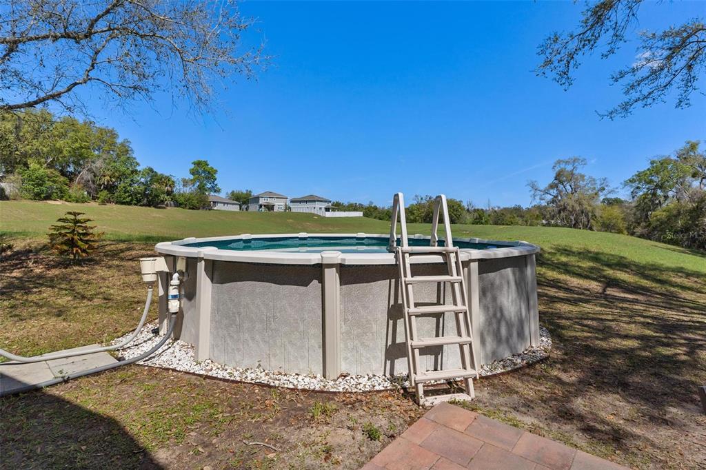 33142 Kaylee Way Leesburg, FL 34788 - Photo 41 of 45 a view of a ocean with a yard