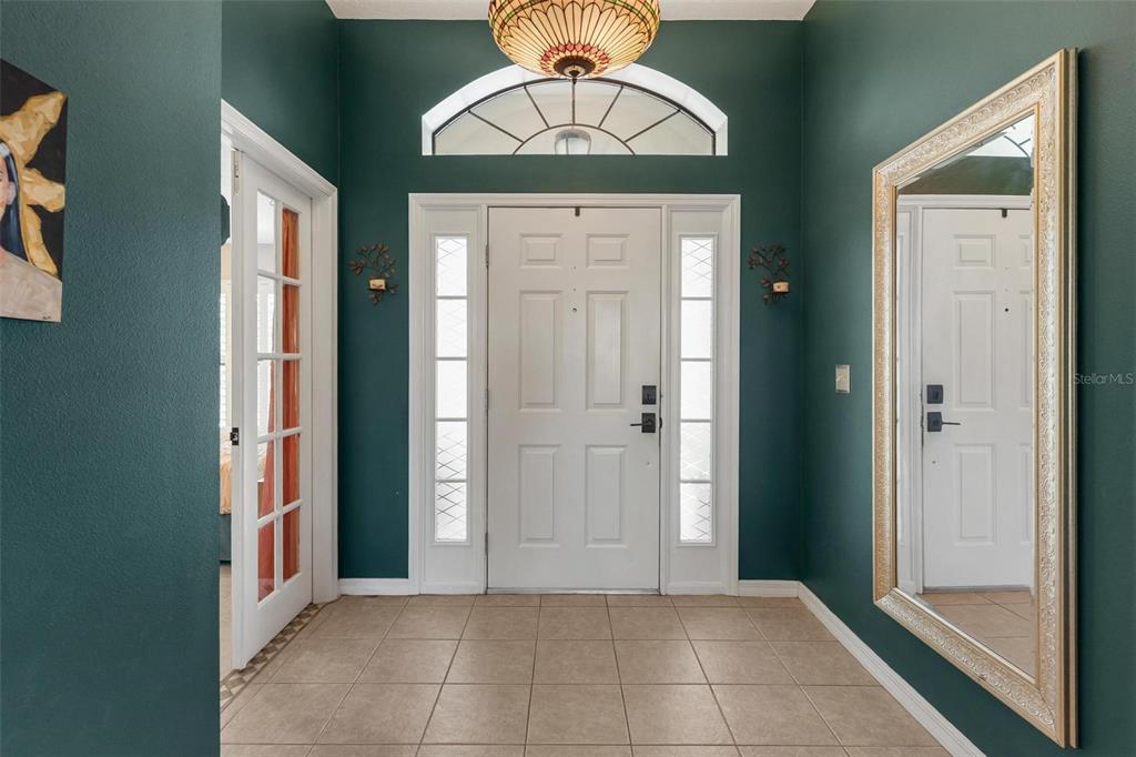 33142 Kaylee Way Leesburg, FL 34788 - Photo 8 of 45 a view of a hallway to rooms