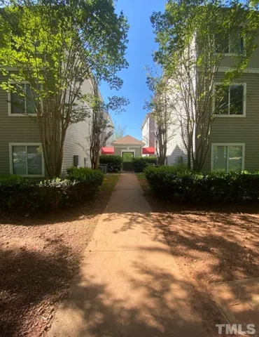 a view of backyard with green space