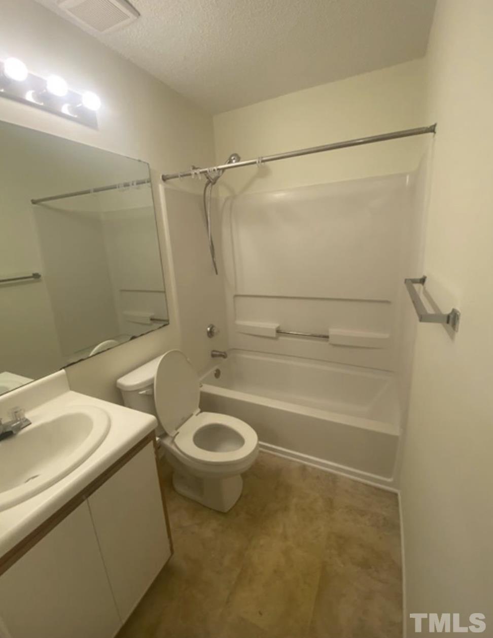 1251 University Court, Unit 203 Raleigh, NC 27606 - Photo 6 of 7 a bathroom with a sink and a shower