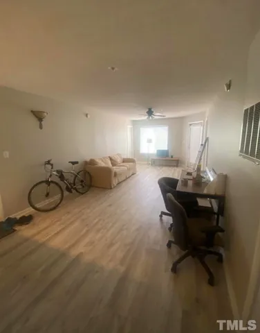 a view of a workspace with furniture