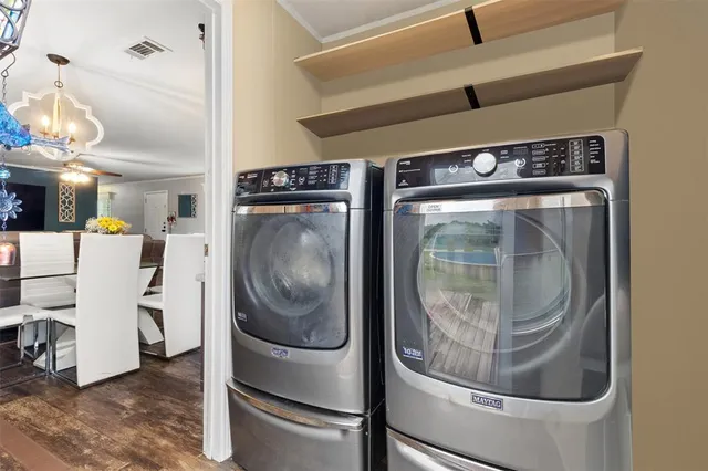 a utility room with dryer and washer