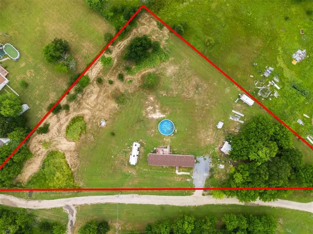 a view of a lake in a yard