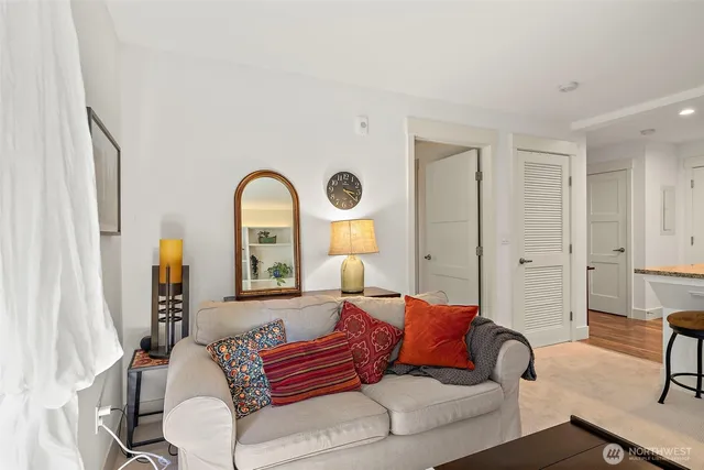 a view of bathroom with shower and mirror