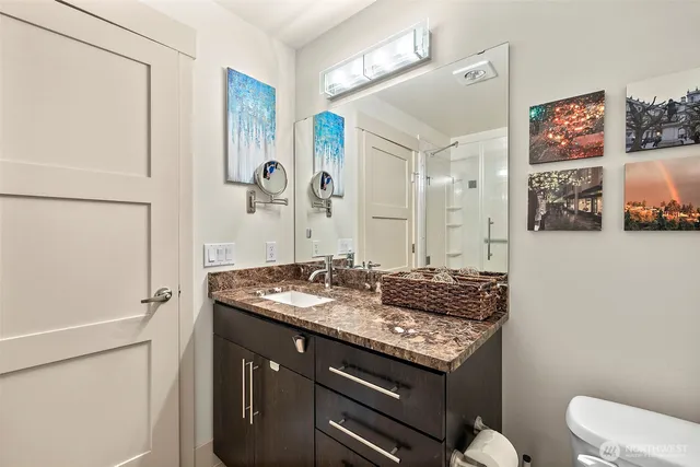a view of a patio with a table and chairs and potted plants