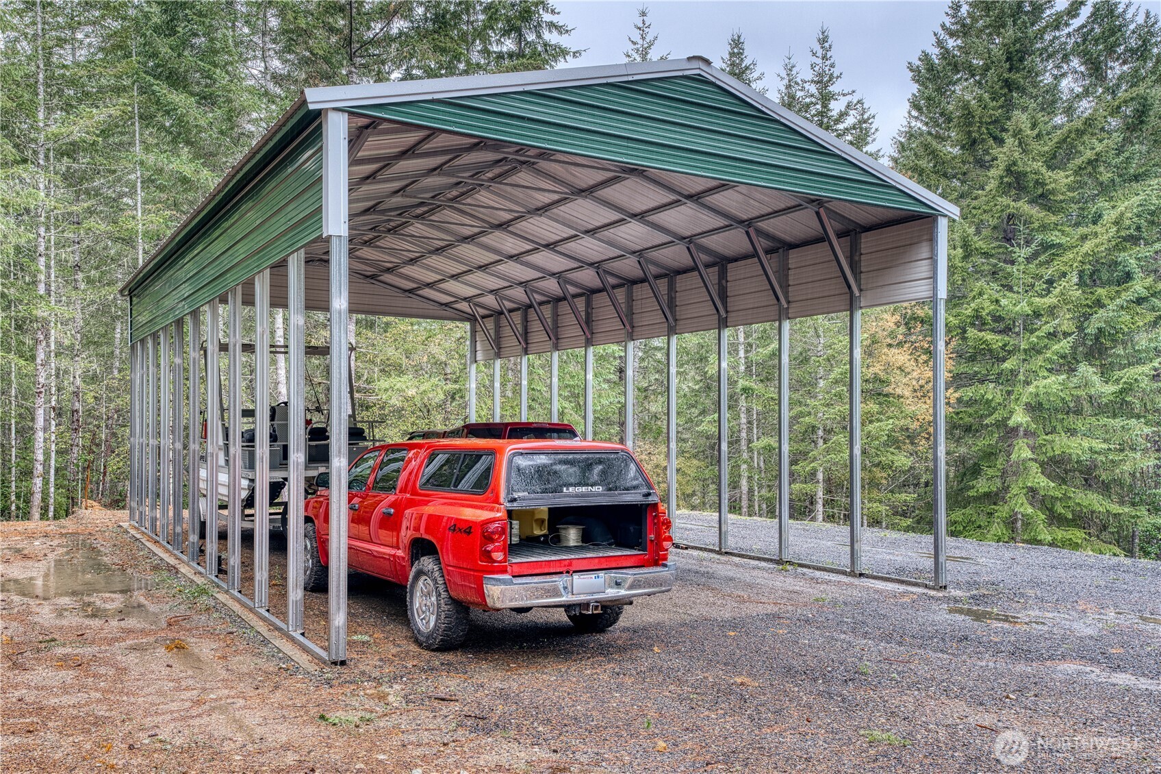991 Northeast Hurd Road Belfair, WA 98528 - Photo 11 of 40 a view of outdoor space with deck and barbeque oven