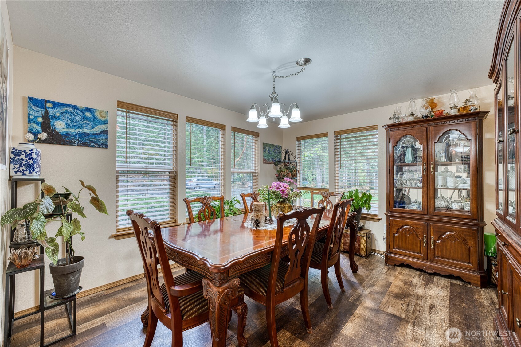 991 Northeast Hurd Road Belfair, WA 98528 - Photo 13 of 40 a view of a dining room with furniture window and wooden floor