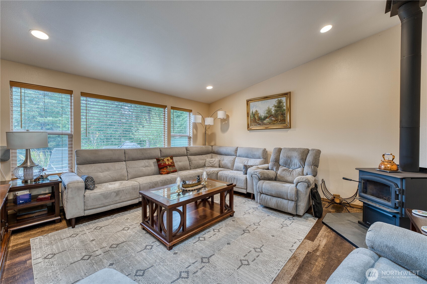 991 Northeast Hurd Road Belfair, WA 98528 - Photo 18 of 40 a living room with furniture and a large window