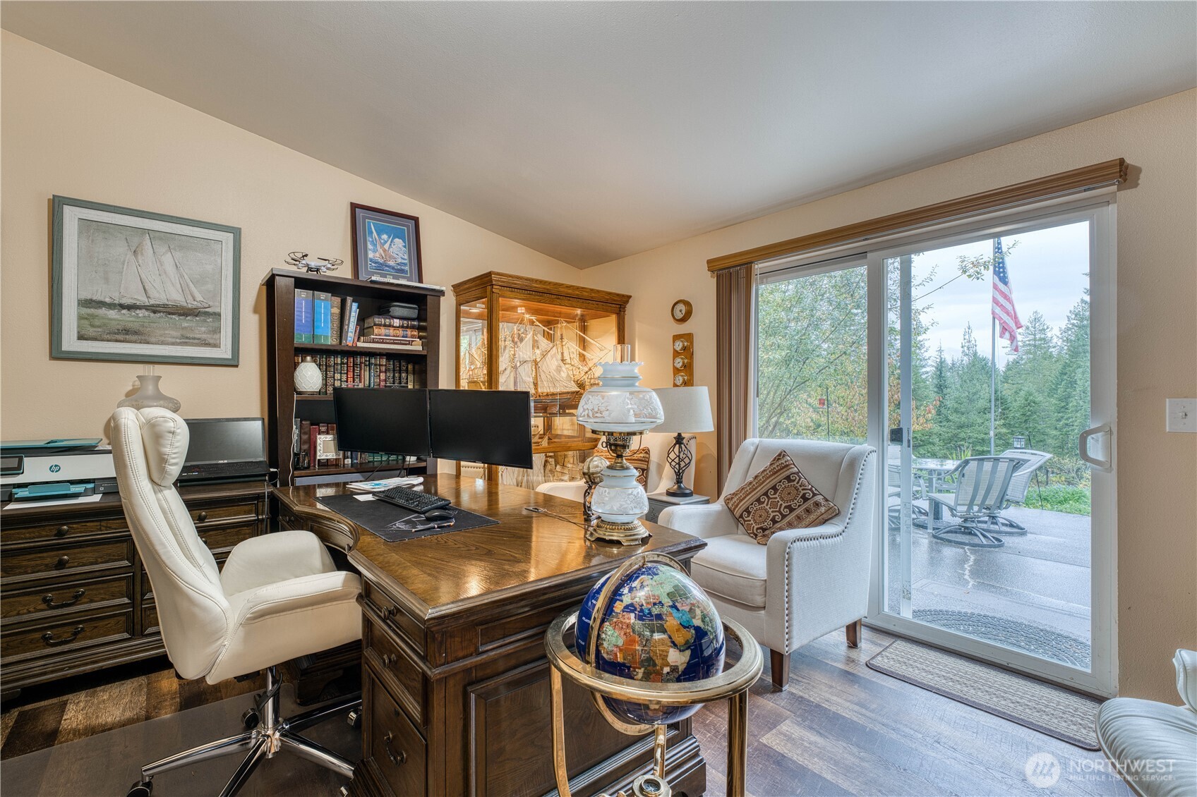 991 Northeast Hurd Road Belfair, WA 98528 - Photo 21 of 40 a work room with furniture and a floor to ceiling window