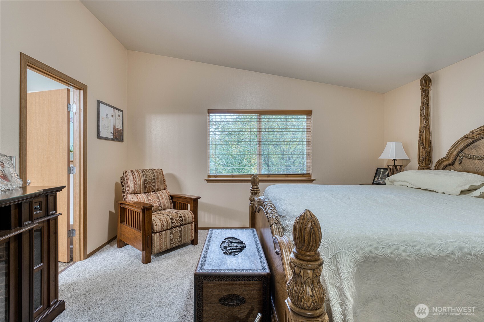 991 Northeast Hurd Road Belfair, WA 98528 - Photo 22 of 40 a bedroom with furniture and a window