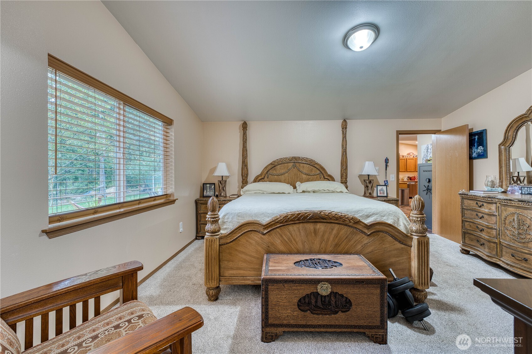 991 Northeast Hurd Road Belfair, WA 98528 - Photo 30 of 40 a bedroom with furniture and a window