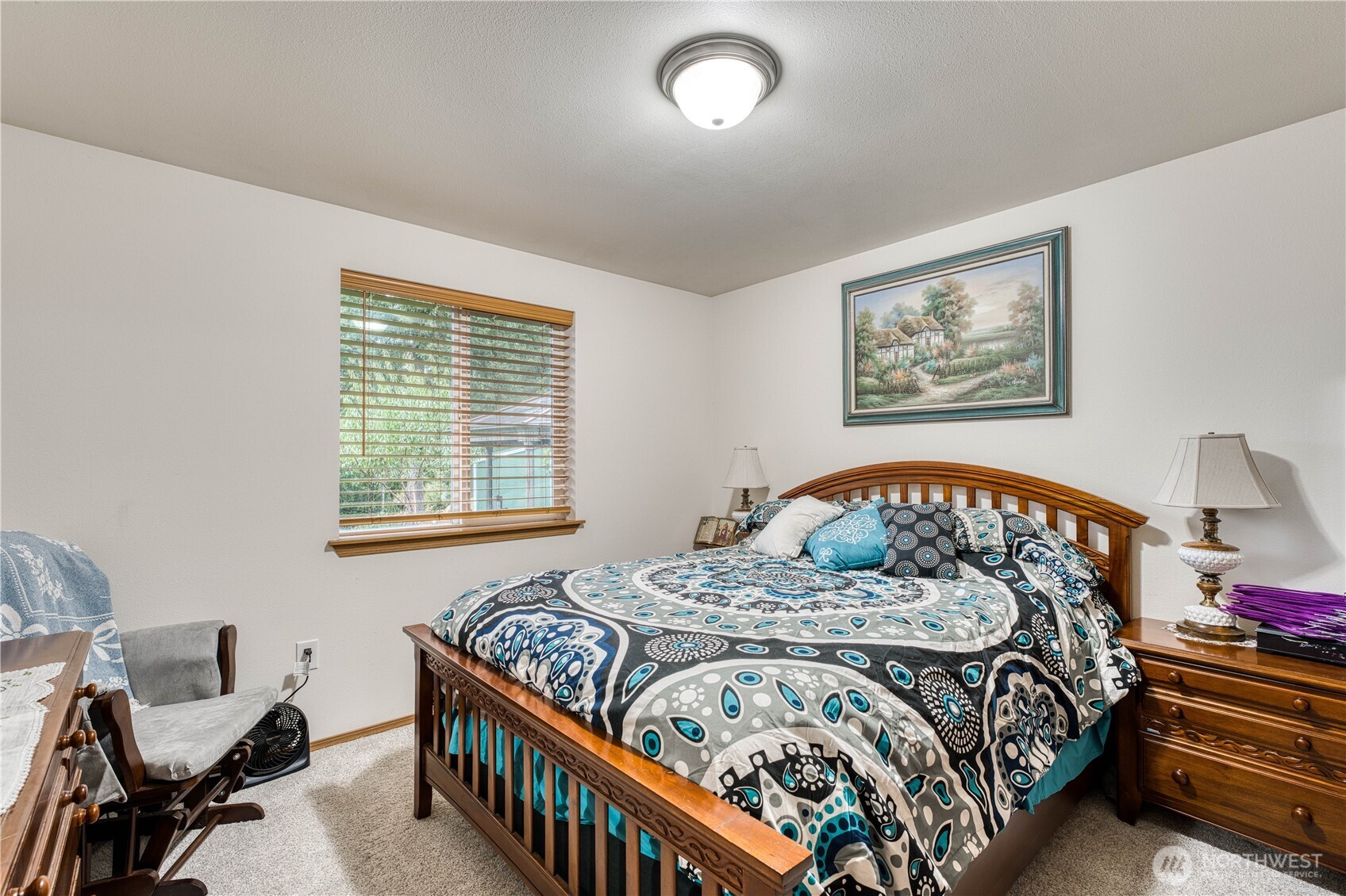 991 Northeast Hurd Road Belfair, WA 98528 - Photo 31 of 40 a bedroom with a bed and a window