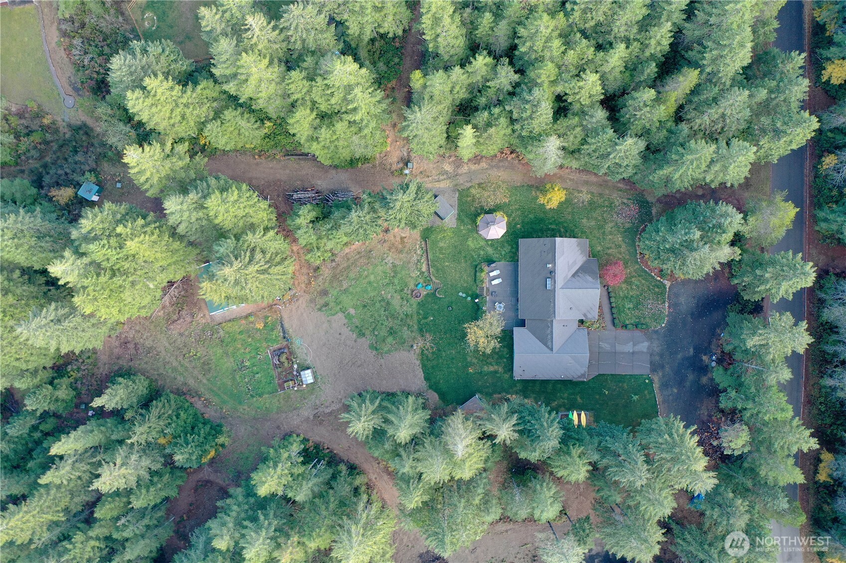991 Northeast Hurd Road Belfair, WA 98528 - Photo 36 of 40 an aerial view of a house with a yard