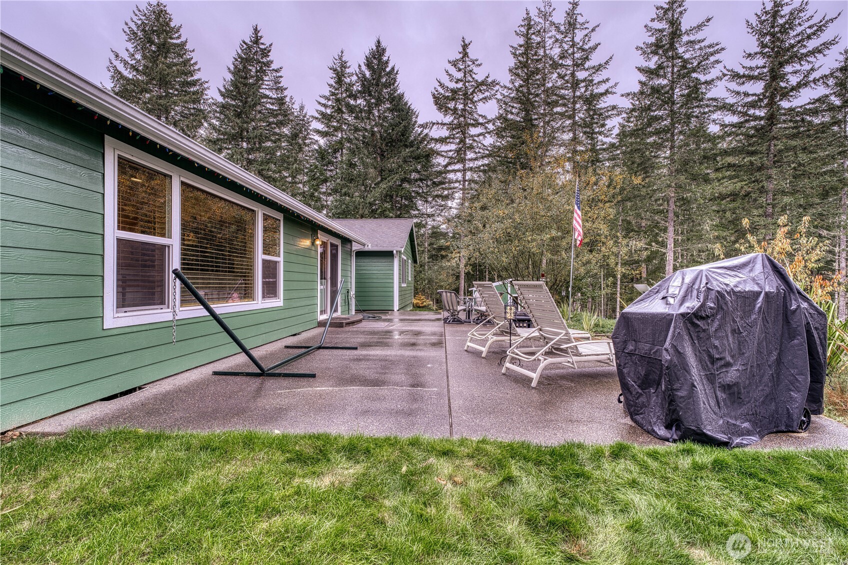 991 Northeast Hurd Road Belfair, WA 98528 - Photo 6 of 40 a view of a backyard with a patio