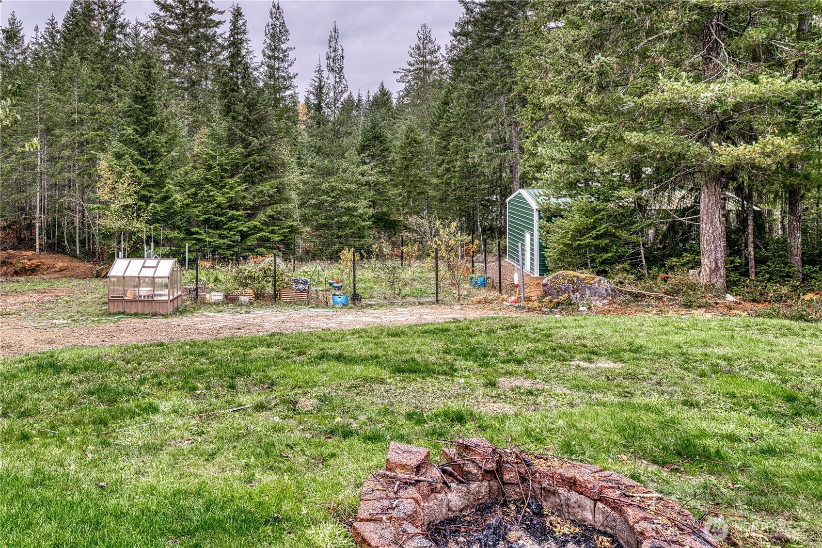 991 Northeast Hurd Road Belfair, WA 98528 - Photo 8 of 40 a view of a park with large trees