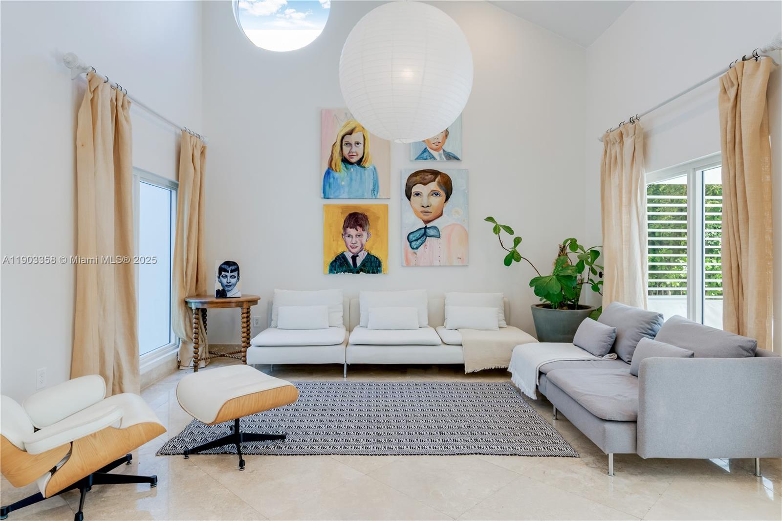 525 Ridgewood Road Key Biscayne, FL 33149 - Photo 43 of 62 a living room with furniture and a potted plant