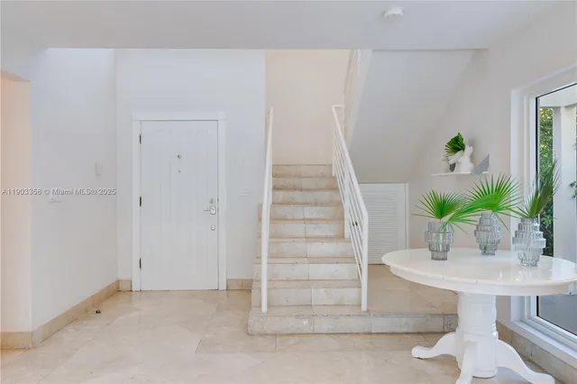 a en suite bathroom with a sink and mirror