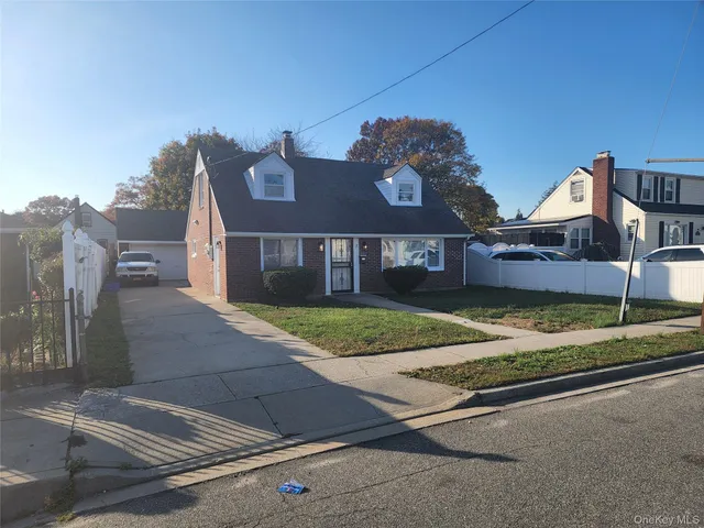 front view of a house with a street