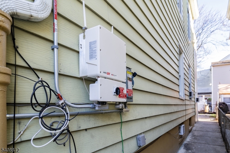 11 Mercer Street Paterson, NJ 07524 - Photo 6 of 10 a view of a patio with table and chairs