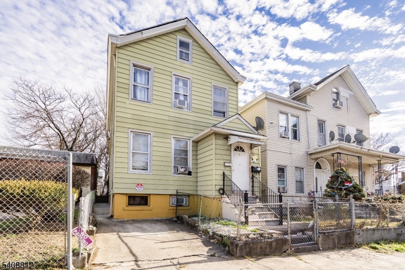 11 Mercer Street Paterson, NJ 07524 - Photo 10 of 10 a view of a house with a patio