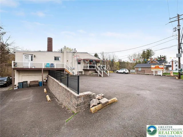 a view of a street with cars