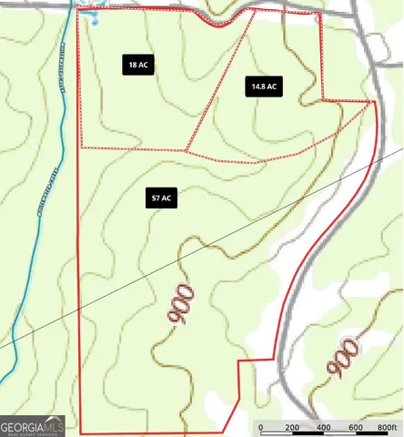 view of a wall with a painting on the wall